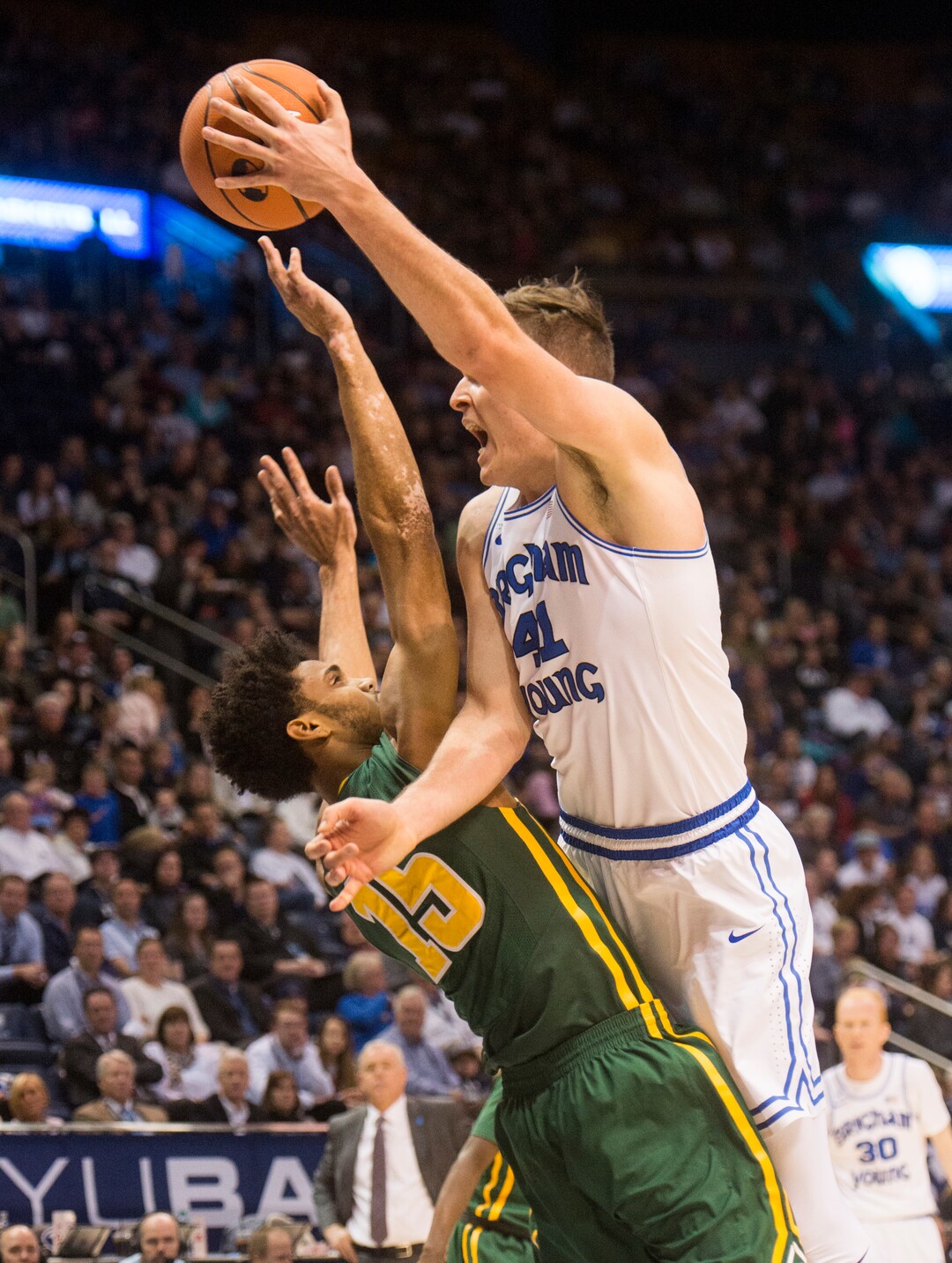 (Rick Egan  |  The Salt Lake Tribune)  Brigham Young Cougars forward Luke Worthington (41) draws a foul as he collides with San Francisco Dons forward Nate Renfro (15), in basketball action at the Marriott Center, Saturday, February 10, 2018.