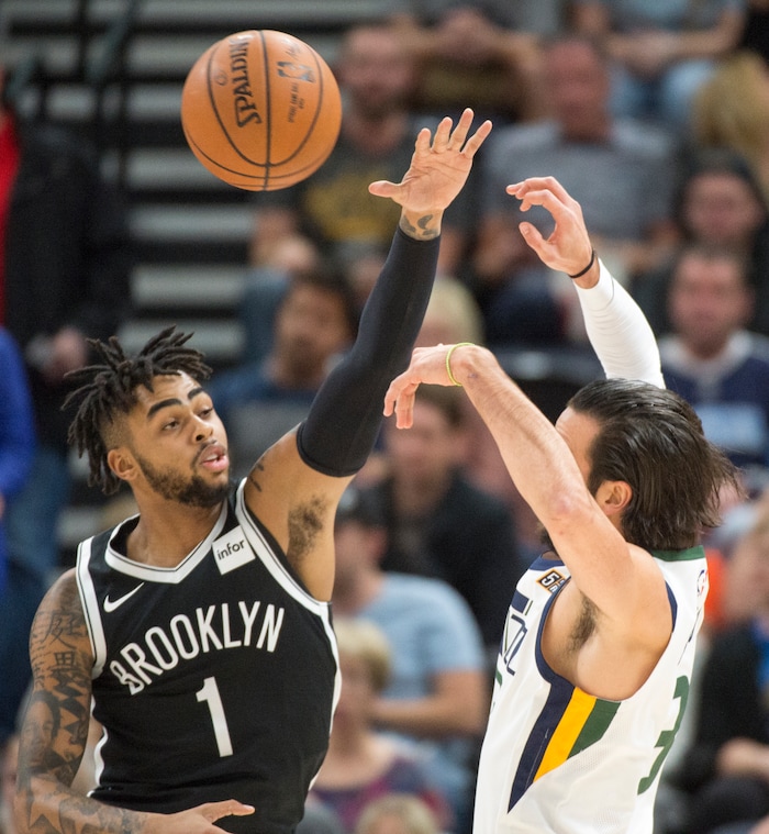 (Rick Egan  |  The Salt Lake Tribune)  Utah Jazz guard Ricky Rubio (3) tosses a pass, as Brooklyn Nets guard D'Angelo Russell (1) defends, in NBA action, Utah Jazz vs. Brooklyn Nets, in Salt Lake City, Saturday, November 11, 2017.