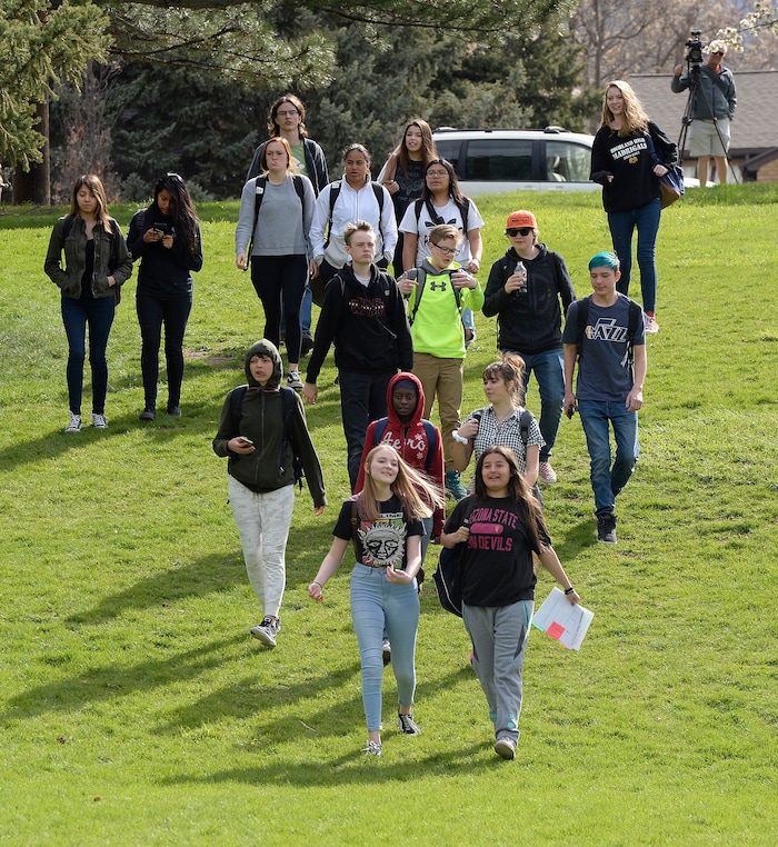 (Al Hartmann  |  The Salt Lake Tribune) 	
Over one hundred students at Highland High School staged a walkout Friday April 20, 2018 in honor of the anniversary of the Columbine High School massacre. Demonstrators walked from the school to Sugar House Park where they made posters, wrote letters to their congressmen and listened to speakers. 