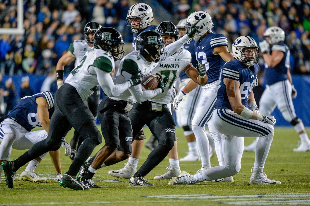 Leah Hogsten  |  The Salt Lake Tribune  Hawaii defensive back Rojesterman Farris II (4) celebrates his interception as Brigham Young University hosts Hawaii at Lavell Edwards Stadium in Provo, Saturday Oct. 13, 2018. 