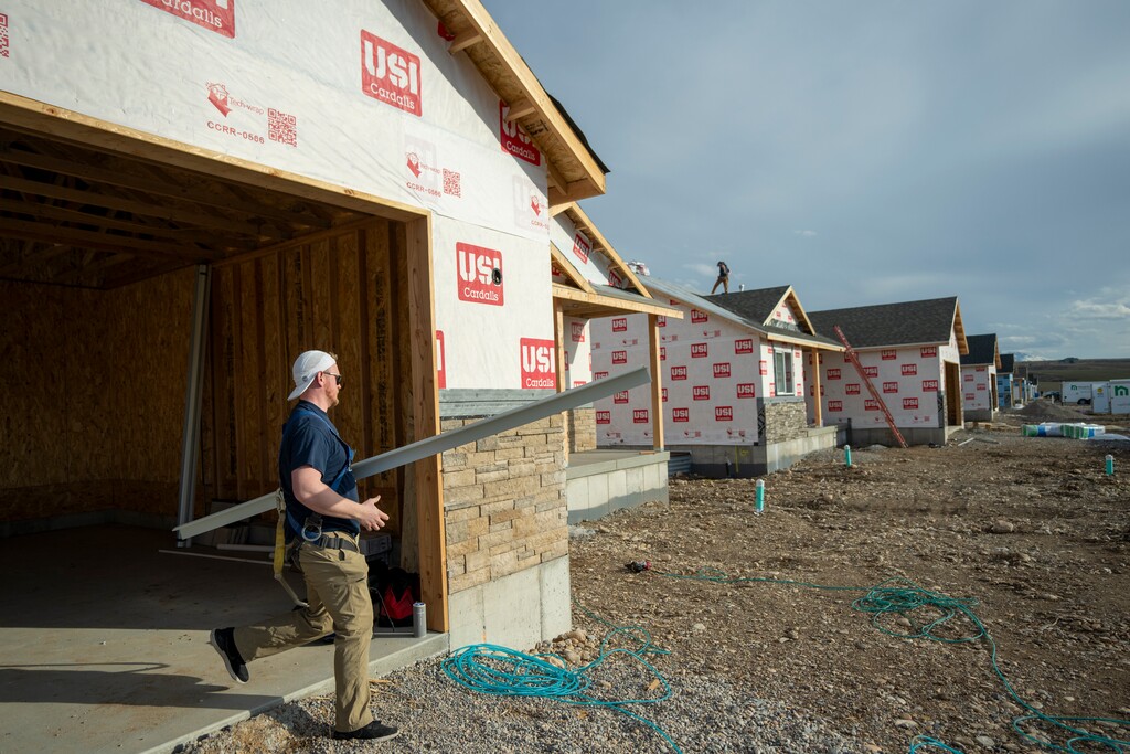 (Rick Egan | The Salt Lake Tribune) Cameron Oldham works in his future Hyrum neighborhood on Wednesday, March 4, 2026.
