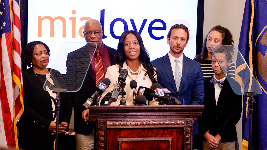 Leah Hogsten  |  The Salt Lake Tribune   Mia Love, the former two-term republican representative from Utah's 4th Congressional District held a press conference at the Utah Republican Party headquarters, Nov. 26, 2018 to discuss her accomplishments, Washington politics, President Donald Trump and her future. Love was joined at the lecturn with her parents Mary Bourdeau and Jean Maxine Bourdeau, husband Jason, daughter Alessa and son Peyton.