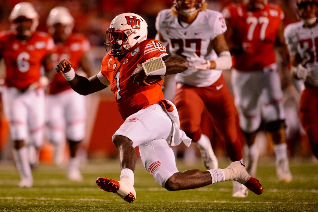 (Trent Nelson  |  The Salt Lake Tribune)  Utah Utes quarterback Tyler Huntley (1) runs the ball as the Utah Utes host the Washington State Cougars, NCAA football at Rice-Eccles Stadium in Salt Lake City on Saturday Sept. 28, 2019.