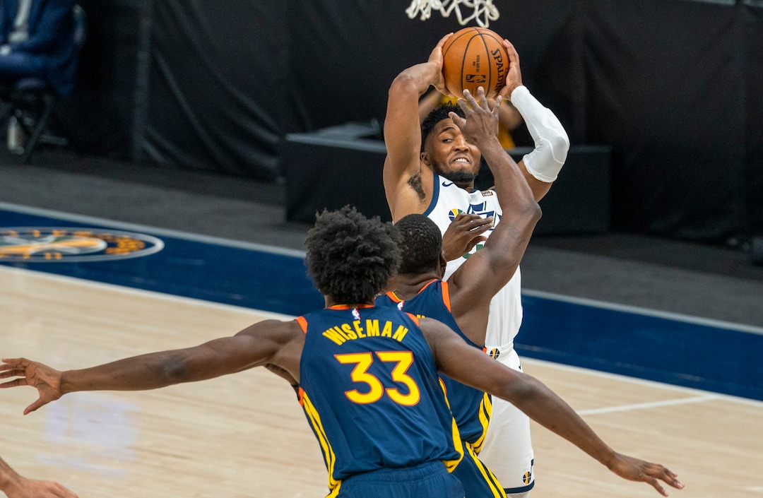(Rick Egan | The Salt Lake Tribune) Utah Jazz guard Donovan Mitchell (45) looks to pass, in NBA action between the Utah Jazz and the Golden State Warriors at Vivint Arena, on  Saturday, Jan. 23, 2021.
