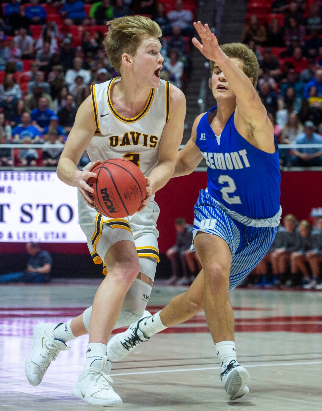(Rick Egan  |  The Salt Lake Tribune)    Davis High guard Jake Sampson (3) brings the ball down court as Fremont Silverwolves Talmage Mitchell (2) defends, in the 6A championship game at the Jon M. Huntsman Center, Saturday Feb. 29, 2020
