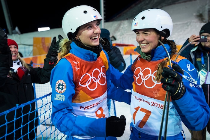 (Chris Detrick  |  The Salt Lake Tribune)  USA's Kiley McKinnon, left, and USA's Madison Olsen react after learning they both qualified for the finals during the Ladies' Aerials Qualification at Phoenix Park during the Pyeongchang 2018 Winter Olympics Thursday, Feb. 15, 2018.  
