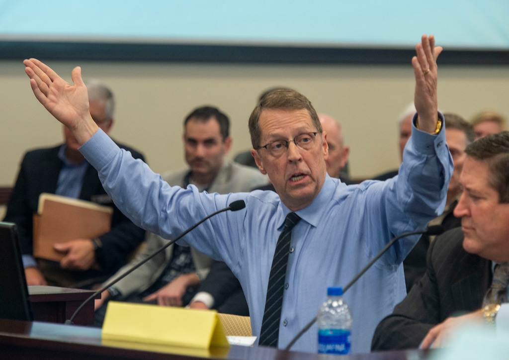(Rick Egan  |  Tribune file photo)  Jim Ferrin speaks out against the sweeping tax overhaul bill during its first public hearing in a committee meeting, Friday, March 1, 2019. Ferrin is a financial adviser who says the legislation would harm his business.