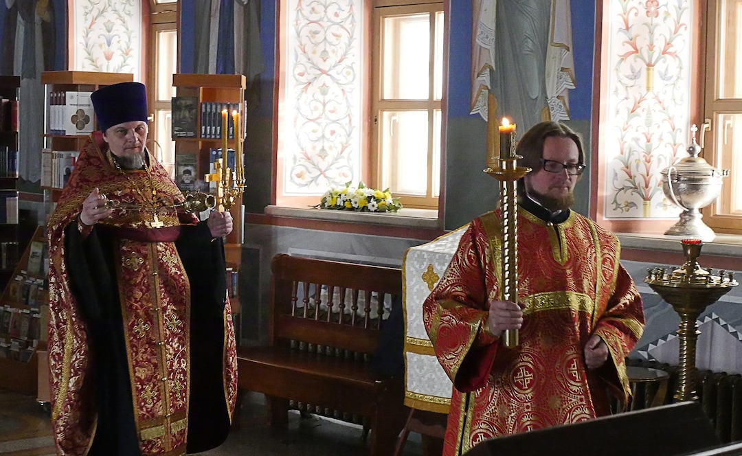 (Michael Stack  |  Special to The Salt Lake Tribune) Father Dmitry Serov, front, performs vespers with Archpriest Michael Nemnonov in Russian Orthodox Church of the Beheading of John the Baptist in Moscow.