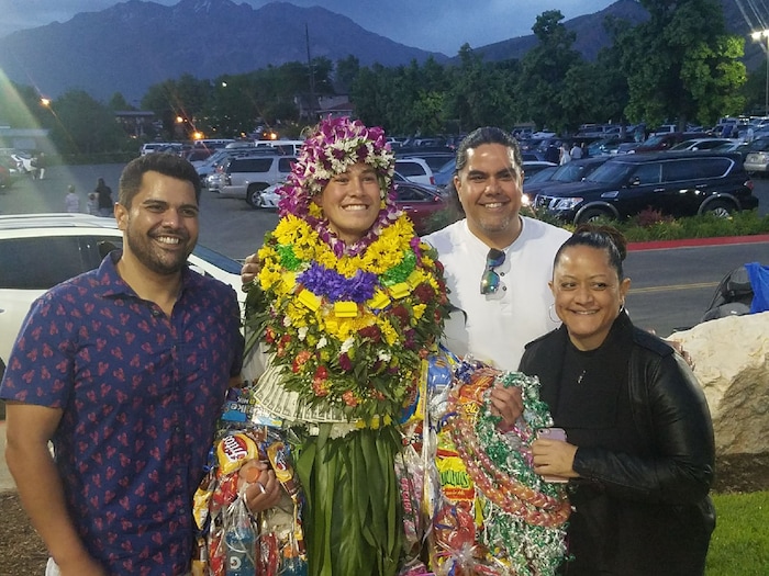 (Courtesy of Simione Malohifo’ou) Finehafo’ou Malohifo’ou graduated from Westlake High School in Utah County last month. He was not allowed to wear leis during the ceremony, and school staff asked him to remove the traditional Tongan ta’ovala cloth he wore under his gown. Pacific Islander students, when allowed, typically wear one or two fresh leis during their graduation to honor their heritage. Relatives then pile more on, in celebration, after the ceremony.