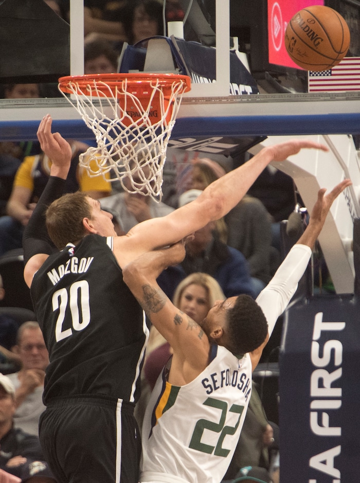 (Rick Egan  |  The Salt Lake Tribune) Utah Jazz forward Thabo Sefolosha (22) takes a shot as Brooklyn Nets center Timofey Mozgov (20) defends, in NBA action, Utah Jazz vs. Brooklyn Nets, in Salt Lake City, Saturday, November 11, 2017.