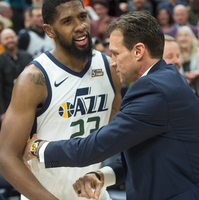 (Rick Egan  |  The Salt Lake Tribune)  Utah Jazz forward Royce O'Neale (23) gets a hug from Utah Jazz head coach Quin Snyder, as theJazz defeat the Spurs 101-99 for their 10th win in a row, in NBA action in Salt Lake City, Monday, February 12, 2018.
