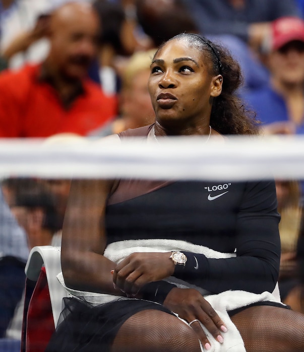 Serena Williams talks with chair umpire Carlos Ramos during a match against Naomi Osaka, of Japan, in the women's final of the U.S. Open tennis tournament, Saturday, Sept. 8, 2018, in New York. (AP Photo/Adam Hunger)