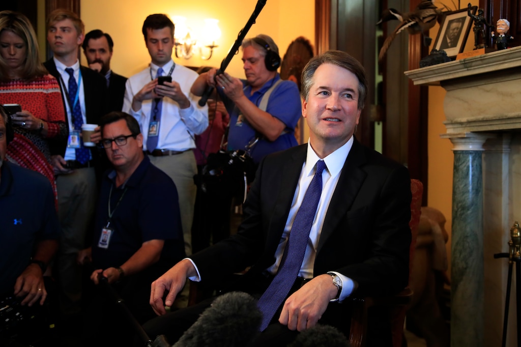 Supreme Court nominee Brett Kavanaugh listens to Sen. Rob Portman, R-Ohio, on Capitol Hill in Washington, during a meeting Wednesday, July 11, 2018. (AP Photo/Manuel Balce Ceneta)