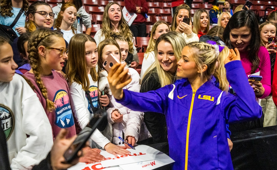 (Rick Egan | The Salt Lake Tribune)  LSU gymnast Livvy Dunne takes a selfie with fans after a gymnastics meet between Utah, LSU, Oklahoma and UCLA at the Maverik Center, on Saturday, Jan. 13, 2024.
