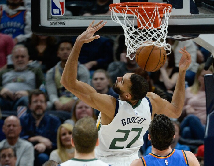 (Francisco Kjolseth  |  The Salt Lake Tribune)  Utah Jazz center Rudy Gobert (27) drops it in as the Utah Jazz host the Oklahoma City Thunder in their NBA basketball game at Vivint Smart Home Arena in Salt Lake City on Mon. Dec. 9, 2019.