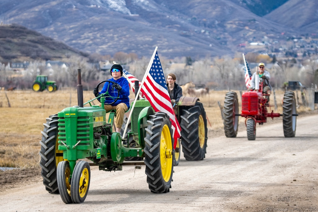 (Rick Egan | The Salt Lake Tribune) Tractors lead the tractorcade in the North Fields of Heber City, on Saturday, Feb. 28, 2026.