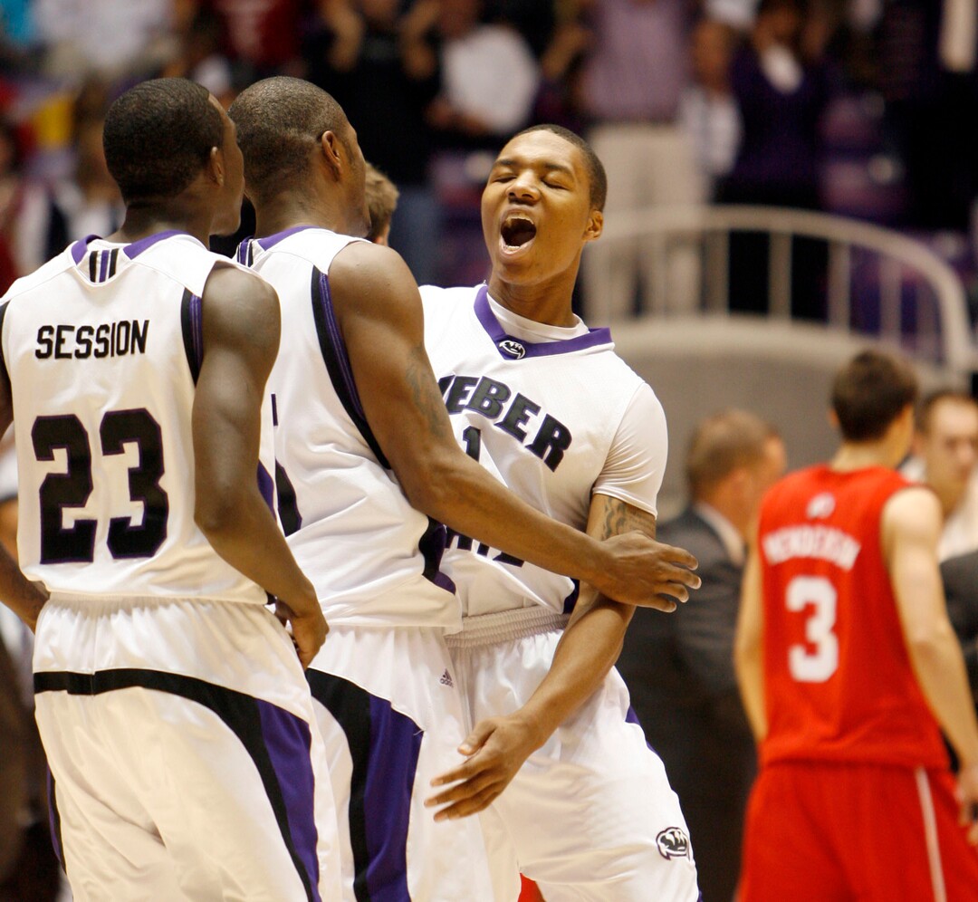 (Steve Griffin  |  Tribune file photo)  Weber State's Damian Lillard jumps into the arms of his teammates after leading the Wildcats to an 83-76 victory over Utah in 2009 at the Dee Events Center in Ogden.