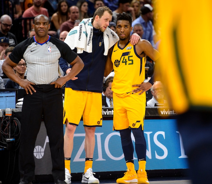(Steve Griffin  |  The Salt Lake Tribune)  Utah Jazz forward Joe Ingles (2) talks with Utah Jazz guard Donovan Mitchell (45) during the Utah Jazz versus Detroit Pistons at Vivint Smart Home Arena in Salt Lake City Tuesday March 13, 2018.