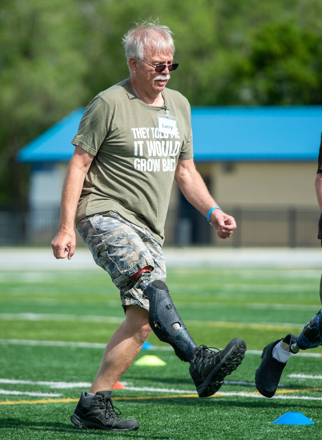 (Rick Egan  |  The Salt Lake Tribune)     Larry Christensen, from Sandy, practices running, during the fourth annual Utah Adaptive Mobility Clinic at Skyline High school. The clinic allows anyone with "lower extremity limb loss or limb difference" or amputees without legs, to practice walking and running. Saturday, June 1, 2019.