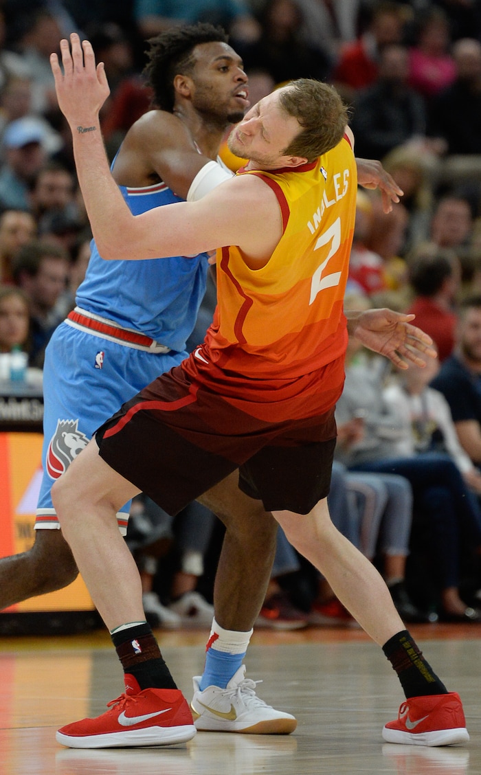 (Francisco Kjolseth  |  The Salt Lake Tribune)  Sacramento Kings guard Buddy Hield (24) gives Utah Jazz forward Joe Ingles (2) a hard hit to the face during the second half of the NBA game at Vivint Smart Home Arena Wed., Nov. 21, 2018, in Salt Lake City.