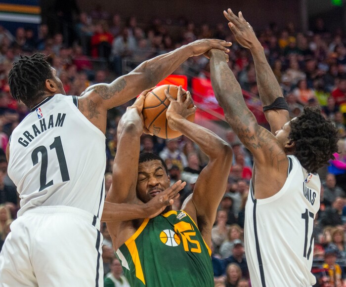 (Rick Egan  |  The Salt Lake Tribune)   Utah Jazz forward Derrick Favors (15) is double-teamed by Brooklyn Nets guard Treveon Graham (21) and forward Ed Davis (17), in NBA action between Utah Jazz and Brooklyn Nets at Vivint Smart Home Arena, Saturday, March 16, 2019.


