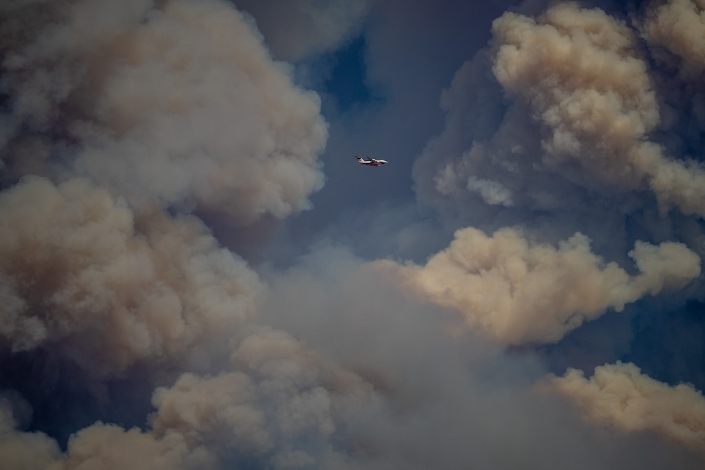 (Trent Nelson  |  The Salt Lake Tribune) Planes battle the Cottonwood Fire, burning east of Beaver, on Tuesday, June 23, 2026.
