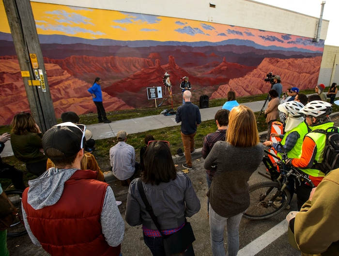 (Steve Griffin  |  The Salt Lake Tribune) Utah graphic artist Josh Scheuerman's mural of the sacred lands of the Bears-Ears Inter-Tribal Coalition is officially dedicated during ceremony on 800 South near 300 West in Salt Lake City on Friday, Nov. 24, 2017.