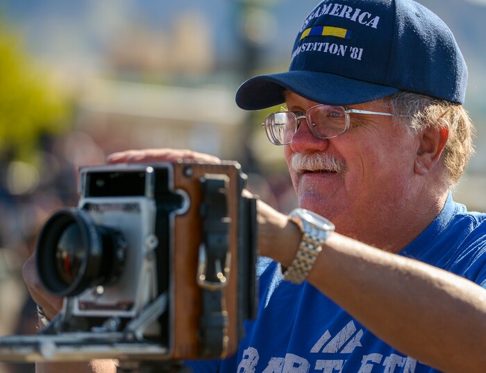 Leah Hogsten  |  The Salt Lake Tribune  David Lyon gets his Crown Graphic 4x5 camera set up for the meeting of the two steam engines on Thursday. In celebration for the 150th anniversary of the transcontinental railroadÕs completion, Union Pacific's iconic steam locomotives, Living Legend No. 844 and Big Boy No. 4014 met at Ogden Union Station, May 9, 2019. 