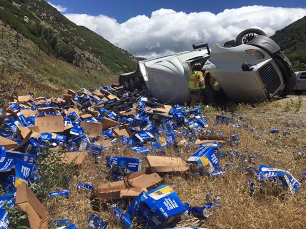 (Photo courtesy of the Weber Fire District) A semi spilled its load of beer along I-84 on Wednesday.