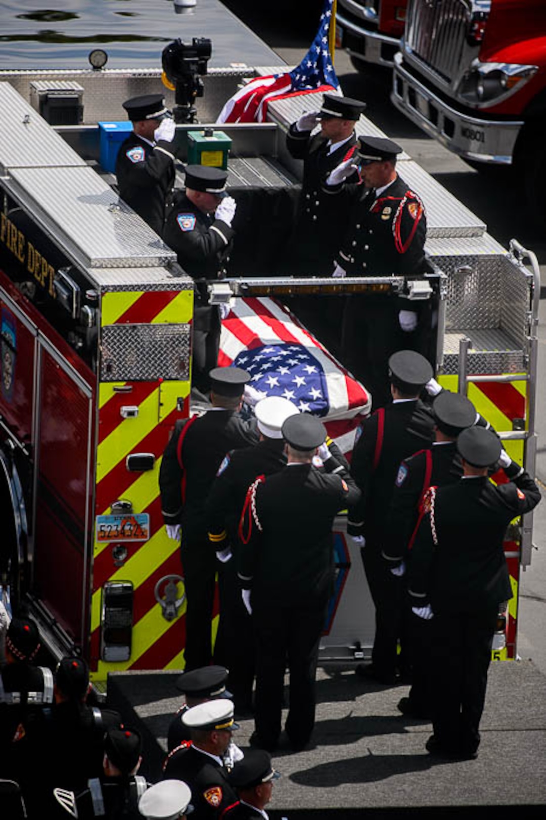 (Trent Nelson | The Salt Lake Tribune)  Funeral services for Battalion Chief Matthew Burchett at the Maverik Center in West Valley City, Monday Aug. 20, 2018.