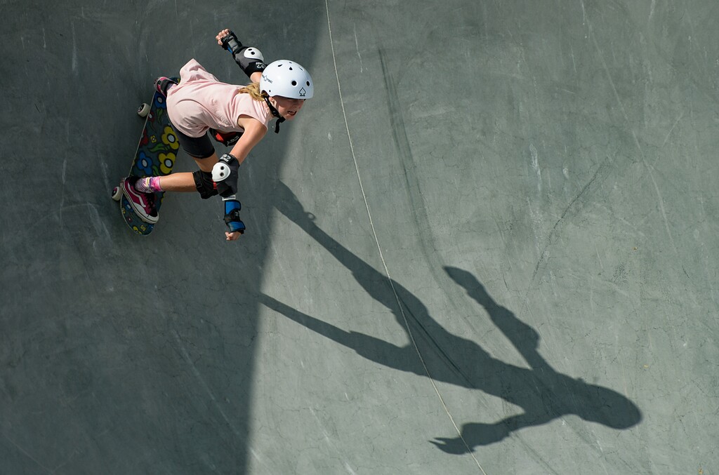 (Francisco Kjolseth | The Salt Lake Tribune) Elle Warne, 10, drops in for the community skate portion during a first look at the new Vans - Utah Sports Commission Skatepark at the Utah State Fairpark on Tuesday, Sept. 3, 2019.