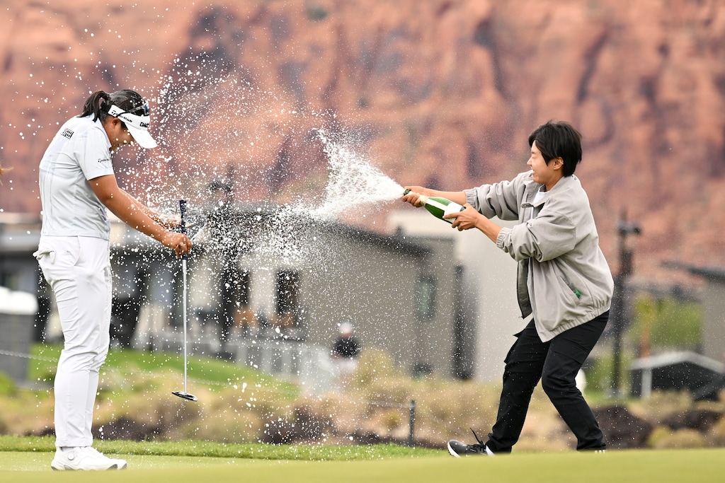 (Candice Ward | AP) Haeran Ryu, left, of South Korea, is sprayed after winning the LPGA Black Desert Championship golf tournament Sunday, May 4, 2025, in Ivins.