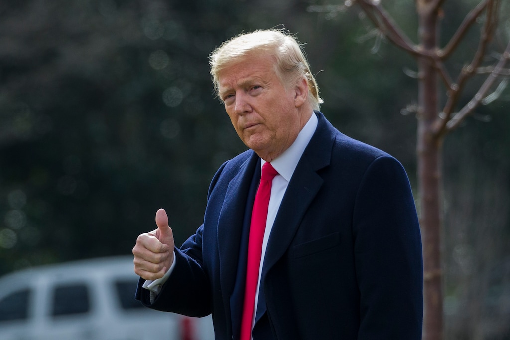 President Donald Trump gives a thumbs up as he walks on the South Lawn of the White House before boarding Marine One for a short trip to Andrews Air Force Base, Md., and then on to Michigan and Iowa, Thursday, Jan. 30, 2020, in Washington. (AP Photo/Alex Brandon)