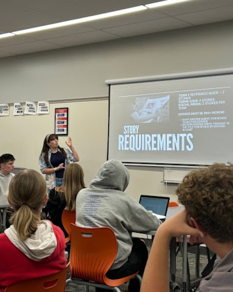 (Courtesy photo) Author Sloan Chase is editor-in-chief of Timpview High's student paper, The Thunderbolt. She is shown here leading a meeting.
