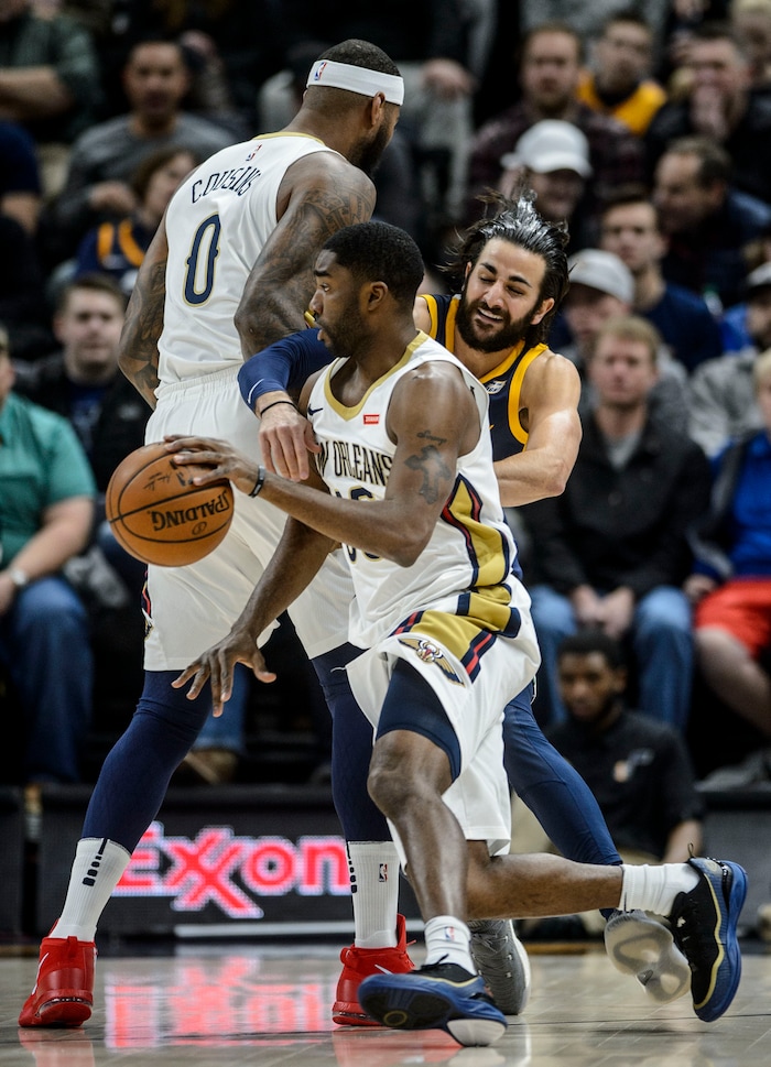 (Steve Griffin  |  The Salt Lake Tribune) Utah Jazz guard Ricky Rubio (3) tries to run through a screen set by New Orleans Pelicans center DeMarcus Cousins (0) while guarding New Orleans Pelicans guard E'Twaun Moore (55) during the the Utah Jazz versus the New Orleans Pelicans NBA basketball game at the Vivint Smart Home Arena in Salt Lake City Wednesday January 3, 2018.