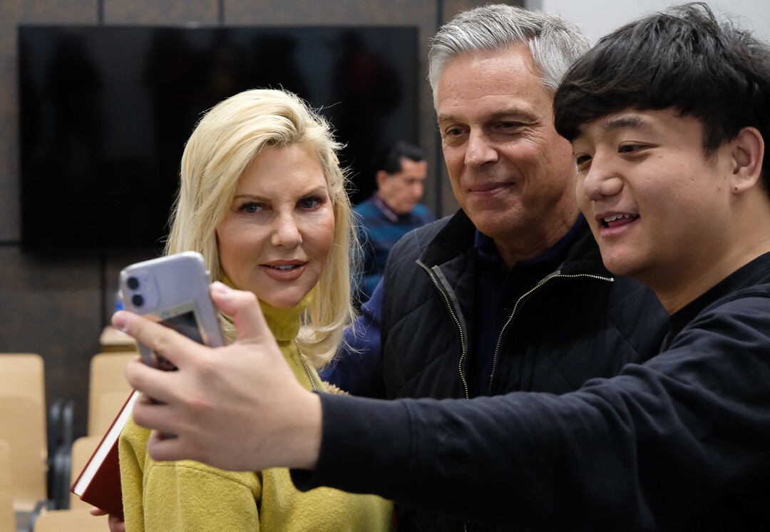 (Francisco Kjolseth  |  The Salt Lake Tribune)  Former Utah Governor and Ambassador Jon Huntsman is joined by his wife Mary Kaye as student Brandon Ong snaps a picture following a conversation at the Hinckley Institute of Politics on the University of Utah campus on Thursday, Dec. 5, 2019, to discuss his long career in public service spanning from Utah's Governor's Mansion to Chinese and Russian ambassadorships and examine the increasing significance Utah plays in our globalized world.