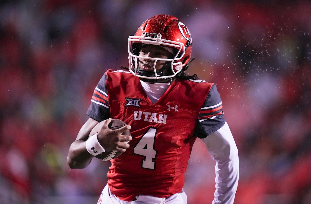 (Bethany Baker | The Salt Lake Tribune) Utah Utes quarterback Devon Dampier (4) runs the ball for a touchdown during the game between the Utah Utes and the Arizona State Sun Devils at The University of Utah in Salt Lake City on Saturday, Oct. 11, 2025.