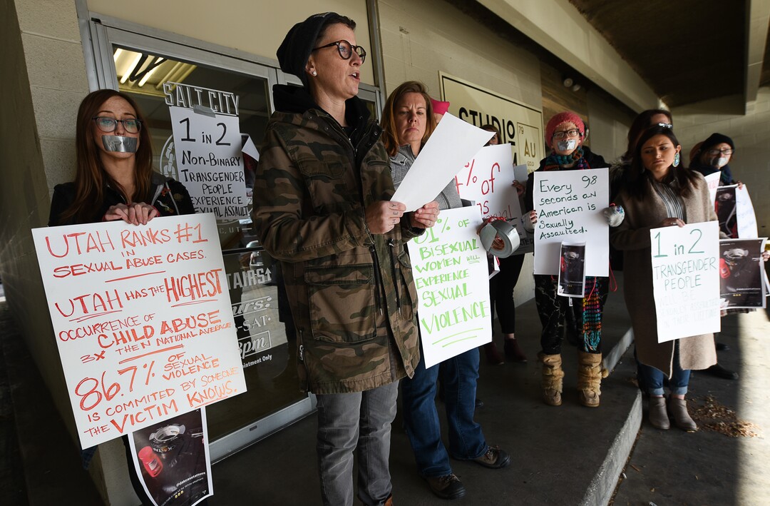 (Francisco Kjolseth  |  The Salt Lake Tribune)  Taking a stand against the normalization of rape and sexual violence, Lesley Ann Shaw reads a letter written to Salt City Tattoo on Friday, Dec. 22, 2017, to protest following an Instagram post made by the shop's official Instagram account. The post in question was of a gift provided during the shop's white elephant exchange, a gift one of the artists at the parlor called a "rape kit," containing leather gloves, black duct tape, a bottle of lubricant, rope, and a knife.