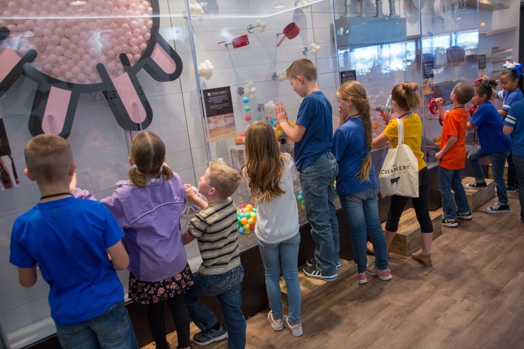 (Courtesy photo) Children learn about dairy foods and the cheese-making process at an interactive exhibit inside The Creamery in Beaver, Utah.