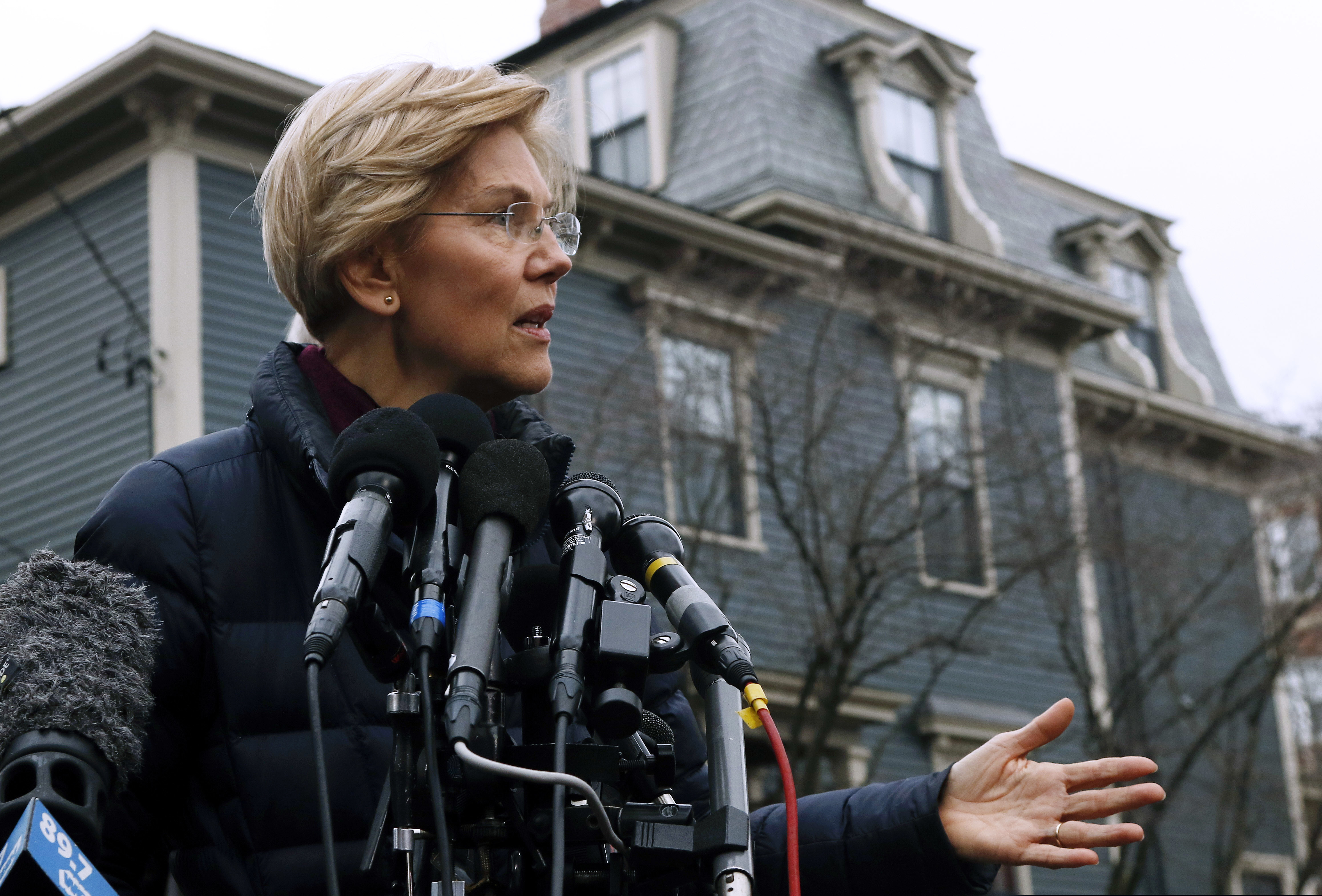 (Bill Sikes | The Associated Press) Sen. Elizabeth Warren, D-Mass., speaks outside her home, Monday, Dec. 31, 2018, in Cambridge, Mass. Warren on Monday took the first major step toward launching a widely anticipated campaign for the presidency, hoping her reputation as a populist fighter can help her navigate a Democratic field that could include nearly two dozen candidates.