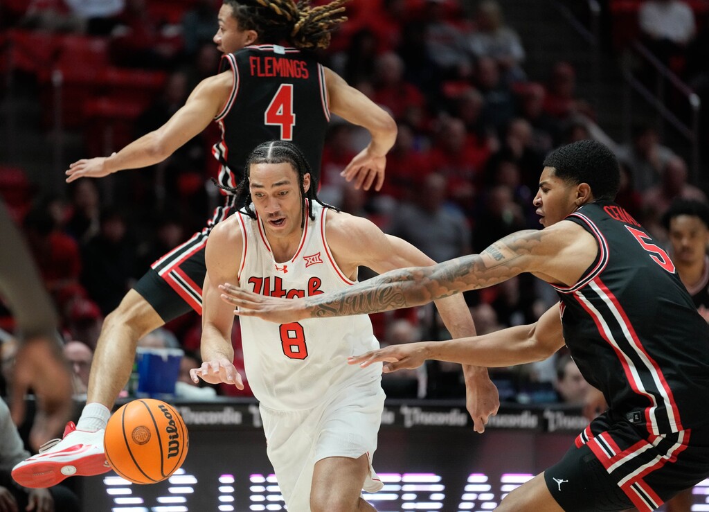 (Francisco Kjolseth | The Salt Lake Tribune) Utah Utes forward Keanu Dawes (8) slips past the defense as Utah hosts Houston, NCAA basketball in Salt Lake City on Tuesday, Feb. 10, 2026.