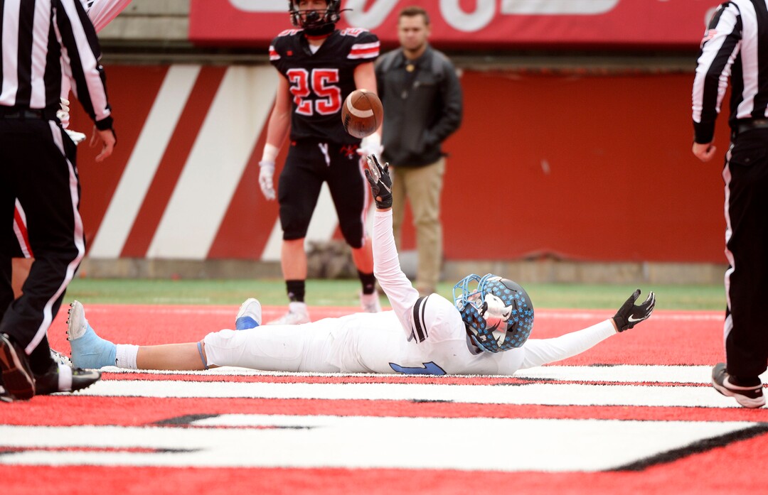 (Leah Hogsten  |  The Salt Lake Tribune)  Sky ViewÕs Mason Falslev celebrates a touchdown. Sky View High School defeated Park City 35-0 to win the 4A State Championship football title, Nov. 11, 2019 at Rice-Eccles Stadium.