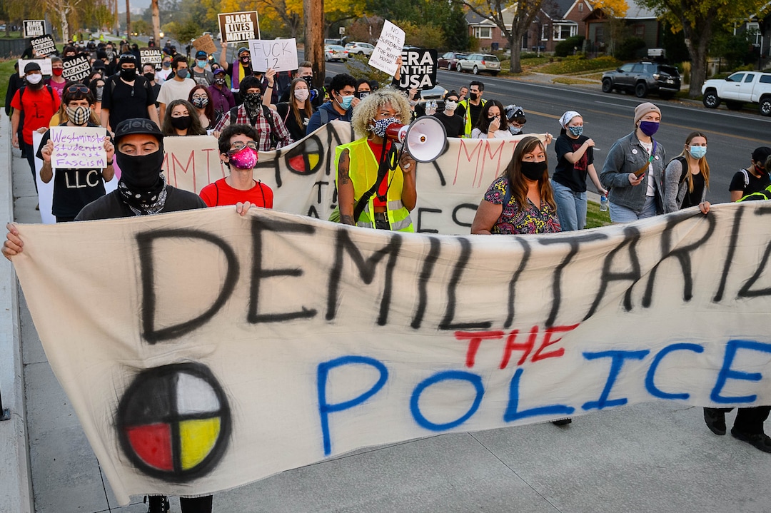 (Trent Nelson  |  The Salt Lake Tribune) Protesters march as Vice President Mike Pence and Sen. Kamala Harris prepare to debate at Kingsbury Hall in Salt Lake City on Wednesday, Oct. 7, 2020.