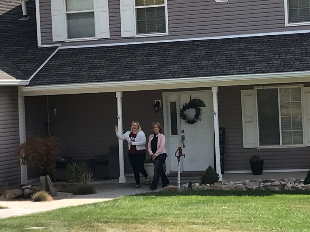(Nate Carlisle | The Salt Lake Tribune) Melissa Ellis, left, and Angela Kelly leave a house in Eagle Mountain on Sept. 23, 2019. They work with a group called Sound Choices Coalition and went to a neighborhood with a high number of polygamists to ask what people there think of a proposal to lower the penalty for polygamy in Utah.