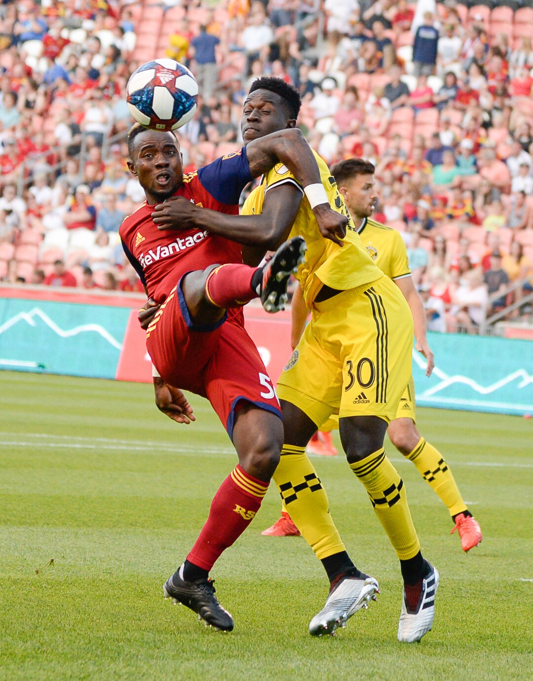 (Francisco Kjolseth  |  The Salt Lake Tribune)  Real Salt Lake forward Sam Johnson (50) gets hung up on Aboubacar Keita (30) as Real Salt Lake hosts Columbus Crew SC, in MLS Soccer at Rio Tinto Stadium in Sandy, Utah on Wed, July 3, 2019.