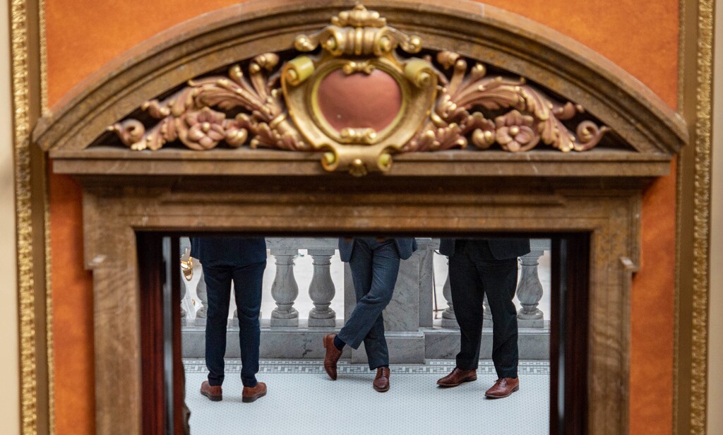 (Francisco Kjolseth | The Salt Lake Tribune) People stand outside the House floor on the second to last day of the general legislative session at the Utah Capitol on Thursday, March 4, 2021.