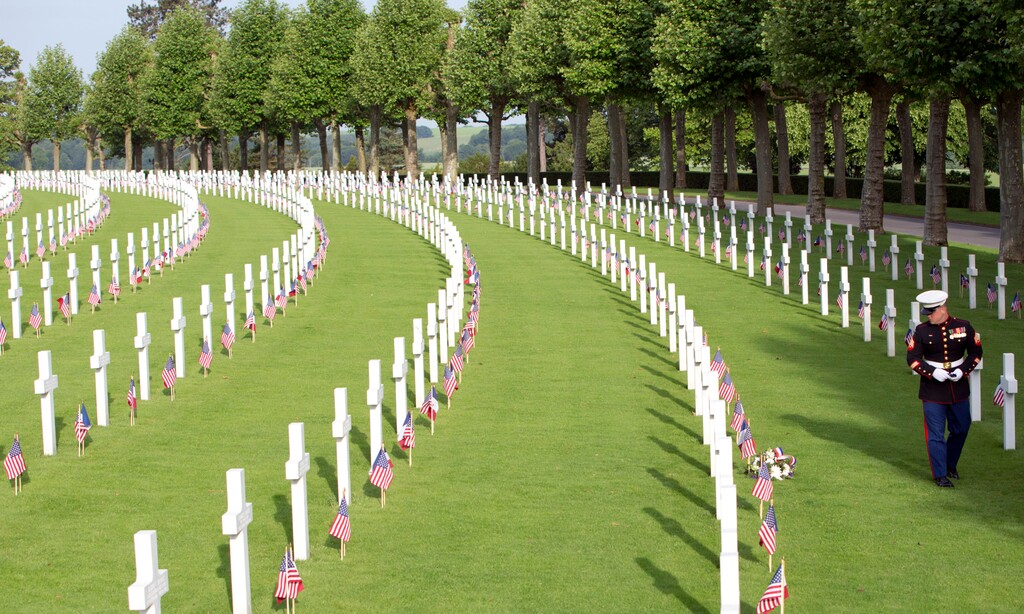 A U.S. Marine Corps soldier visits graves prior to a Memorial Day commemoration at the Aisne-Marne American Cemetery in Belleau, France, Sunday, May 27, 2018. The cemetery contains more that 2,000 American dead and is located in front of the battlefield of Belleau Wood. (AP Photo/Virginia Mayo)