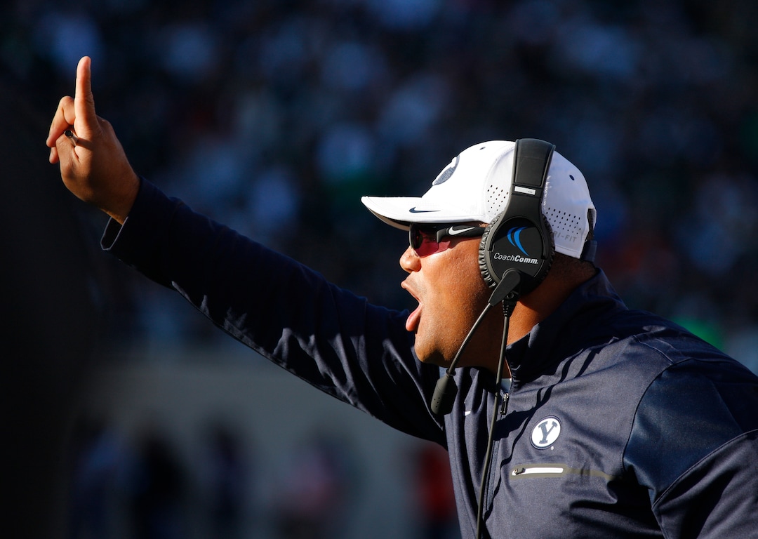 BYU coach Kalani Sitake signals during the second quarter of an NCAA college football game against Michigan State, Saturday, Oct. 8, 2016, in East Lansing, Mich. BYU won 31-14. (AP Photo/Al Goldis)