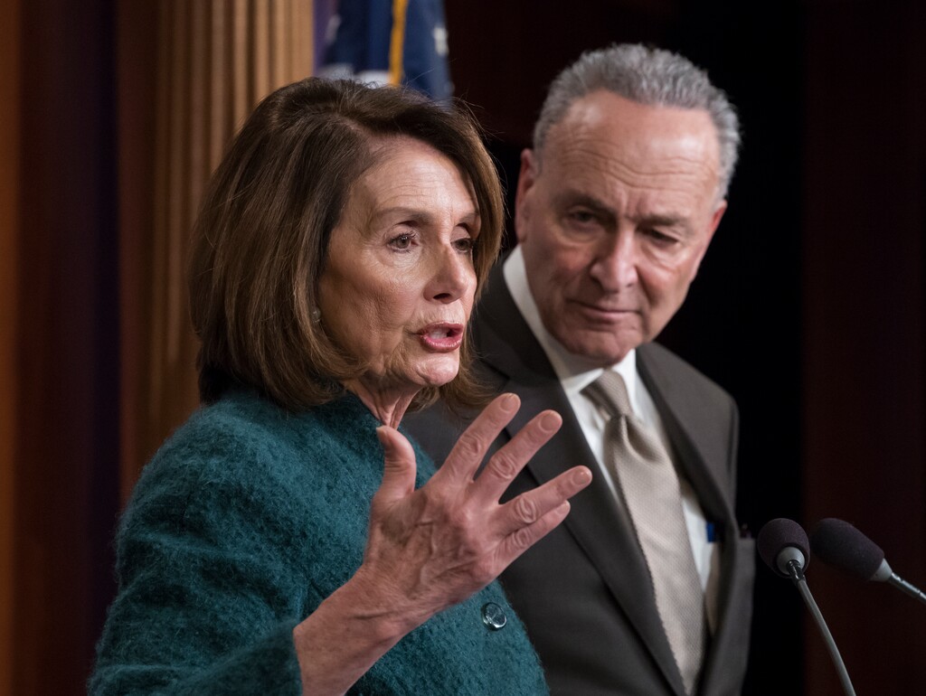 House Minority Leader Nancy Pelosi, D-Calif., and Senate Minority Leader Chuck Schumer, D-N.Y., speak to reporters about the massive government spending bill moving through Congress, on Capitol Hill in Washington, Thursday, March 22, 2018. The bipartisan $1.3 trillion spending bill pours huge sums into Pentagon programs and domestic initiatives ranging from building roads to combatting the nation's opioid abuse crisis, but left Congress in stalemate over shielding young Dreamer immigrants from deportation and curbing surging health insurance premiums. (AP Photo/J. Scott Applewhite)