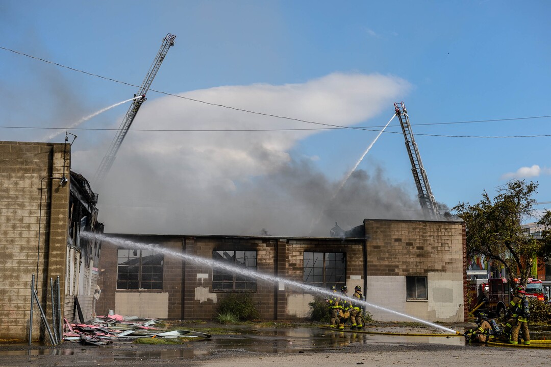 (Trent Nelson  |  The Salt Lake Tribune) Crews work to extinguish a fire at 800 South 200 West in Salt Lake City on Wednesday, Sept. 9, 2020.